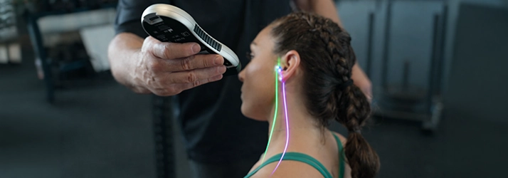 Erchonia Laser Device Being Used On A Patient's Neck